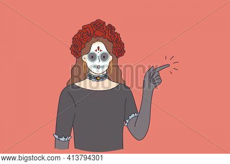 Celebrating Happy Halloween Holiday Concept. Horrible Female In Special Outfit With White Clay Skull