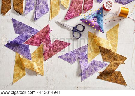 Stacks Of Multi-colored Pieces Of Fabric, Pieces Of Fabric Sewn In The Shape Of The Letter Z, Pincus