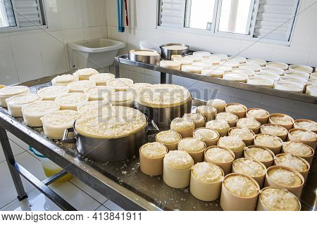 São Roque De Minas - Mg, Brazil - December 12, 2020: Process Of Salting The Cheese With Coarse Salt 