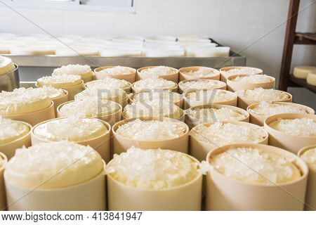 São Roque De Minas - Mg, Brazil - December 12, 2020: Process Of Salting The Cheese With Coarse Salt 
