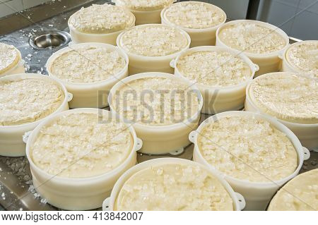 São Roque De Minas - Mg, Brazil - December 12, 2020: Process Of Salting The Cheese With Coarse Salt 