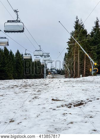 Chair Lift With Snow Cannons At The Beginning Of Winter In Winterberg