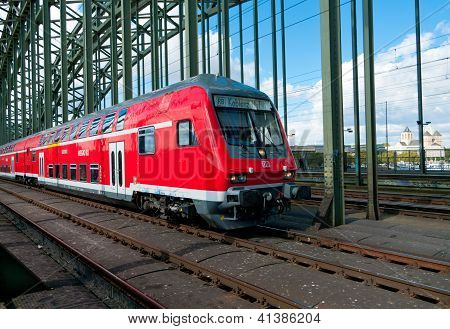 Red Train On Bridge