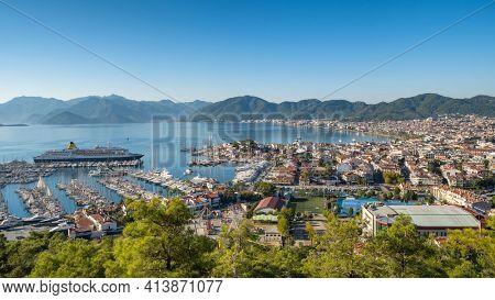 Cityscape of resort town Marmaris in Mugla province, Turkey. Marmaris is a port city and popular tourist resort on the Mediterranean coast in Mugla Province, Turkey.