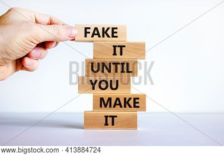 Fake It Until You Make It Symbol. Wooden Blocks With Words 'fake It Until You Make It'. Businessman 