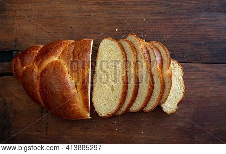 Easter Sweet Bread, Greek Tsoureki Braid On Wooden Background