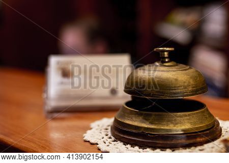 Antique Doorbell Located At The Reception Of A Hotel For The Receptionist's Attention By Guests