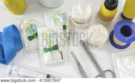 Medical Kit For Rapid Healthcare In Nursing Due To An Emergency Or Emergency With Scissors, Syringes