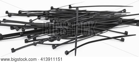 Very Resistant Black Nylon Flanges Stacked In A Pile On White Background