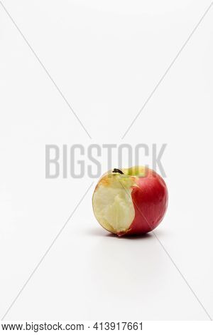A Ripe Red Apple Isolated On A White Background. Red Bitten Apple On White Background. Apple Clippin