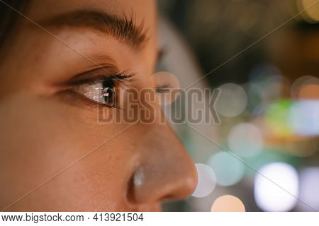 Closeup Of Teary And Upset Eyes Of Young Asian Woman Feeling Depressed And Sad While Standing In Cit