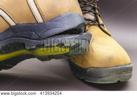 Torn Men's Leather Shoes. Torn Shoe Sole. Shoe Repair. Close-up