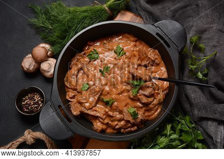 Beef Stroganoff With Cremini And Champignons On A Frying Pan.