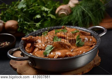 Traditional Beef Stroganoff With Cremini And Champignons In Casserole