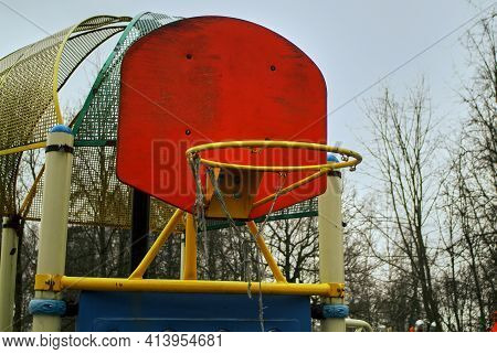 Basketball Ring With A Torn Net In The Park, Moscow