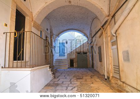 Alleyway in Noci. Puglia, Italy.