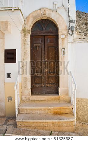 Wooden door. Noci. Puglia. Italy.