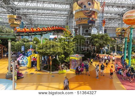 A Roller Coaster Zips Overhead At The Mall Of America In Bloomington, Mn On July 06, 2013