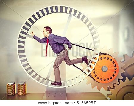 businessman run in huge hamster wheel