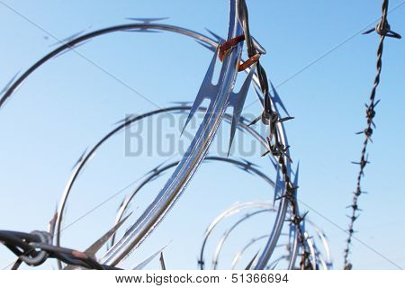 Barbwire and razor wire fence