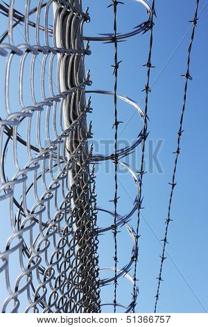 Barbwire and razor wire fence