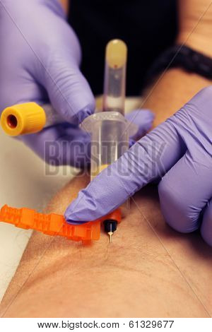 Genuine photos of a Phlebotomist aka Nurse, Doctor, or Trained Medical Professional taking Real Blood samples for analysis from a patient. Photos taken by the Patient while its happening.  