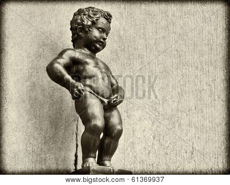 Grunge Vintage Look Of Manneken Pis In Brussels