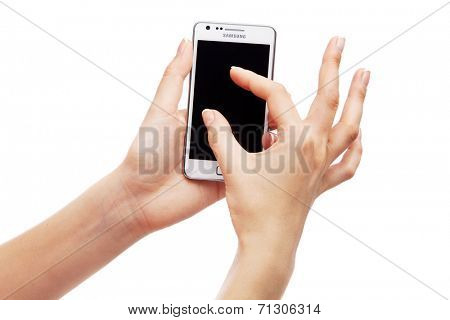 WROCLAW, POLAND - AUGUST 26, 2014: Photo of a Samsung Galaxy S2 Android smartphone
