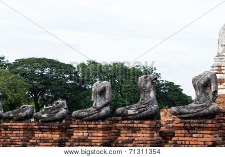 Ruins Of Buddha Statue At Chaiwatthanaram Temple, Ayutthaya .