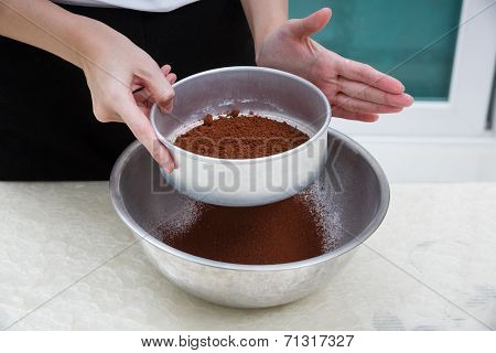 Sifting Cocoa Powder
