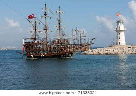 Tourists enjoying sea journey on vintage sailships in Alanya Turkey.