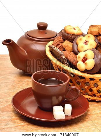 Ceramic Teapot, Cup And Sauser With Biscuits
