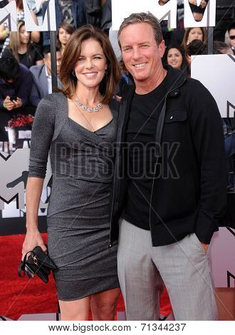 LOS ANGELES - APR 13:  Linden Ashby & Susan Walters arrives to the 2014 MTV Movie Awards  on April 13, 2014 in Los Angeles, CA.                