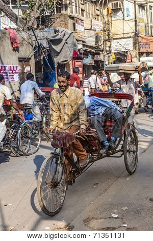 Cycle Rickshaws With Passenger In The Streets