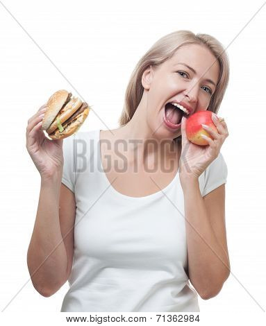 Girl Chooses Apple Not A Burger Isolated On White Background