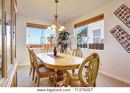 Beautiful Carved Wood Dining Table Set In Bright Room