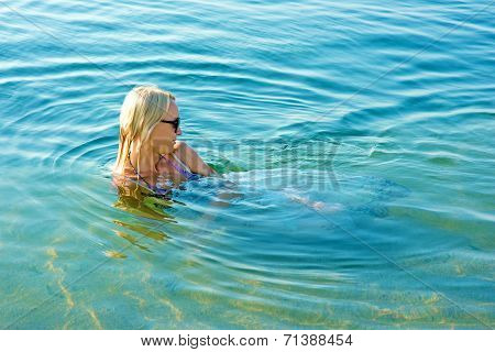 Girl Bathes Seaborne