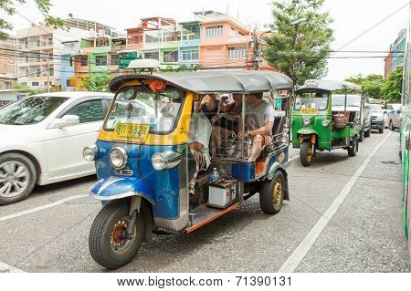 TukTuk (A  typical quick cab) ride in chinatown area of Bangkok Thailand