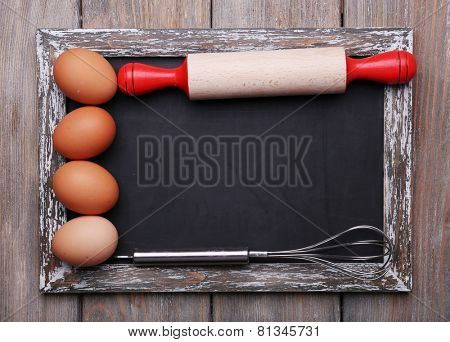 Blackboard menu blank on rustic wooden planks background