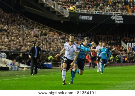 VALENCIA, SPAIN - JANUARY 25: Gomes (L) and Krychowiak during Spanish League match between Valencia CF and Sevilla FC at Mestalla Stadium on January 25, 2015 in Valencia, Spain