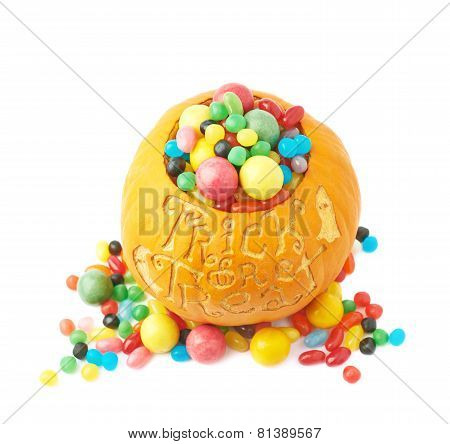 Trick or treat pumpkin filled with candy sweets