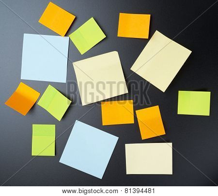 Blackboard covered with sticky notes