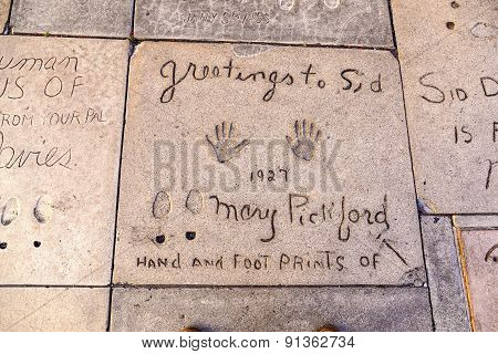 Handprints In Hollywood Boulevard In The Concrete Of Chinese Theatre's Forecourt