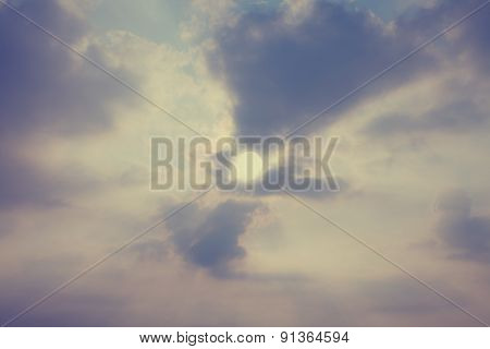 Sky With Cumulus Clouds And A Bright Sun Closeup
