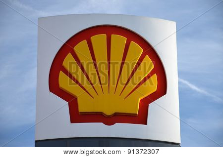 sign of Shell against blue sky