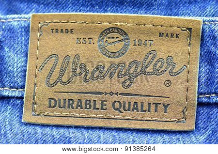 Closeup of Wrangler label on blue jeans