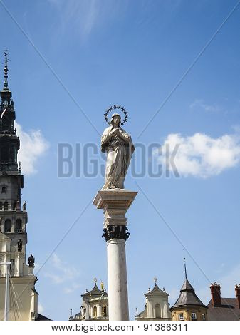 Statue Of Our Lady Of The Immaculate Conception In The Middle Of The Square In Front Of The Monaster