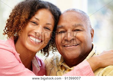 Senior African American man and granddaughter