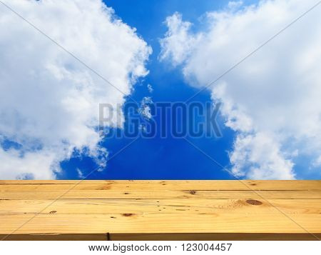 Wood for placing the product on the clouds and sky background.