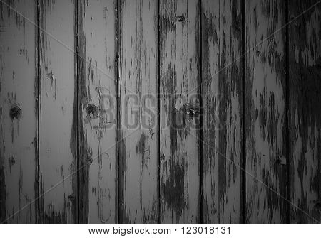 Weathered grey wooden background with old planks